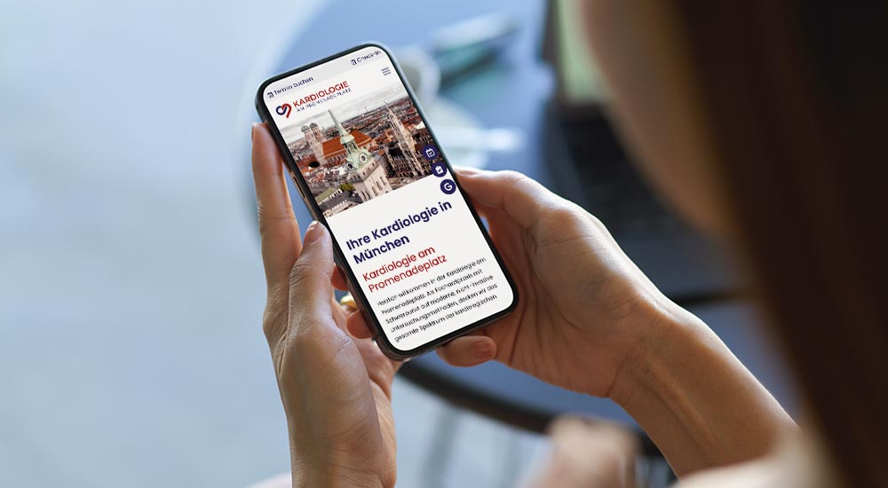 Patient looks at her mobile phone and sees the practice's new website